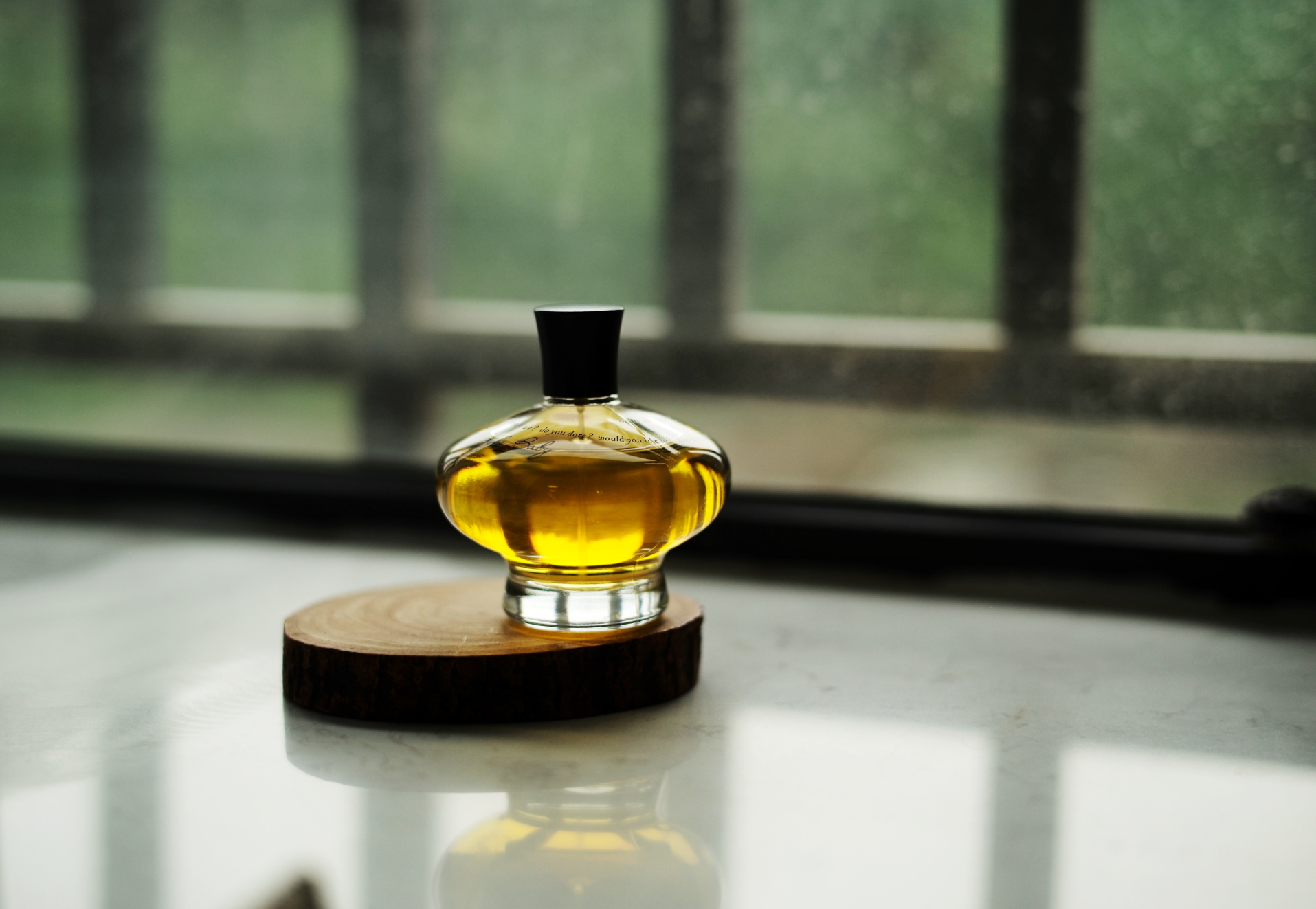 perfume infront of window