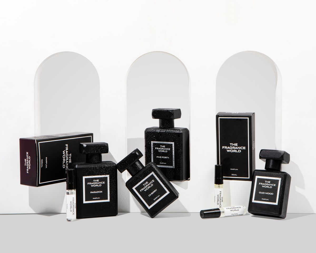 The Fragrance World collection featuring bottles and 5ml spray bottles