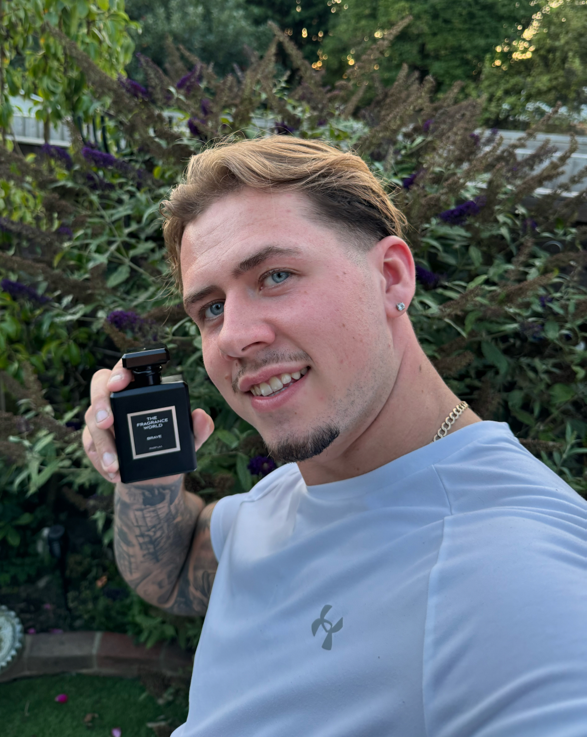 Customer with TFW bottle outdoors